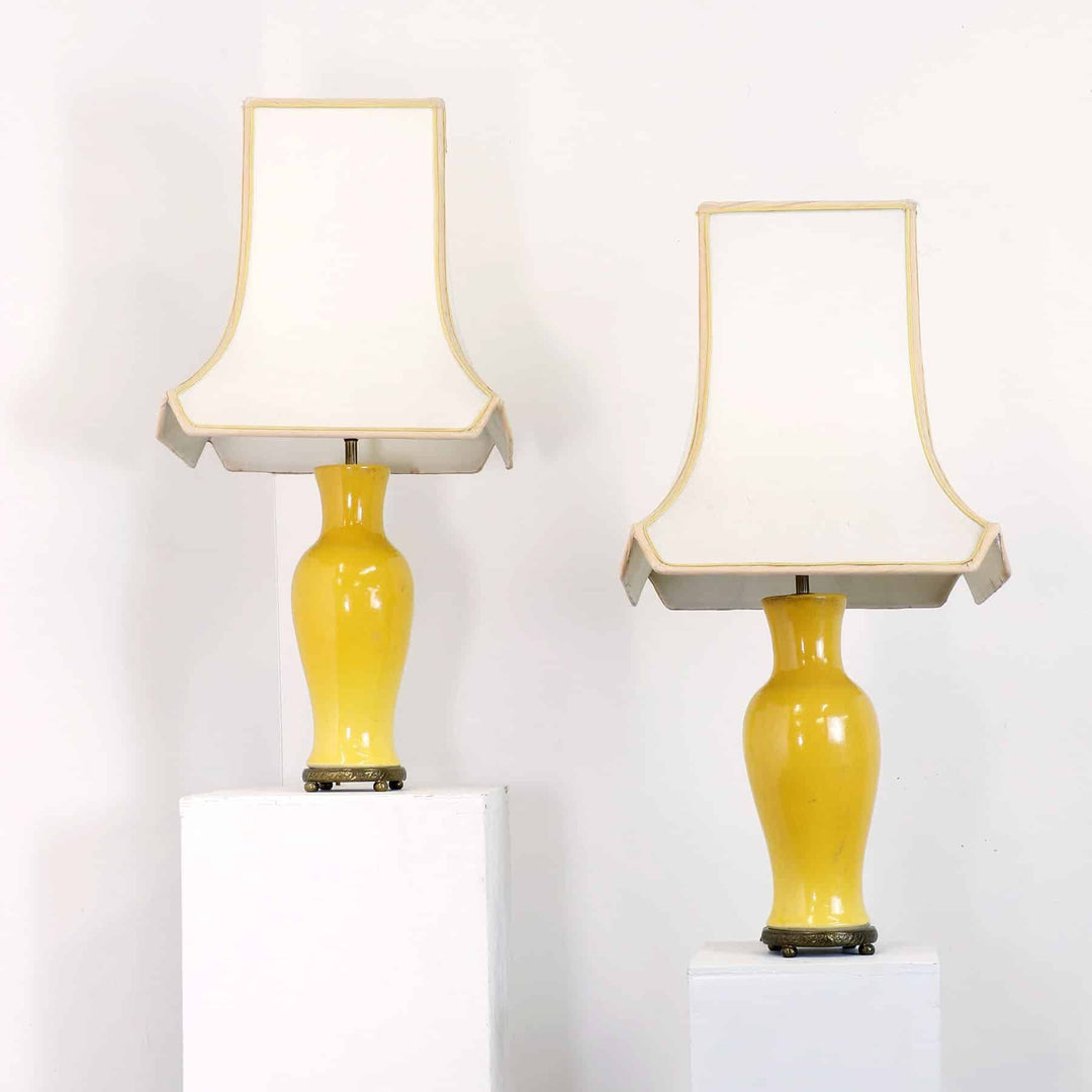 A pair of Chinese-style yellow porcelain table lamps